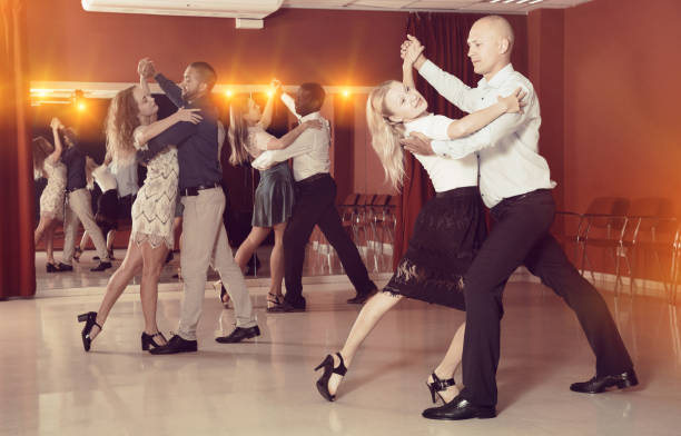 istock People dancing slow ballroom dances in pairs 1294555041