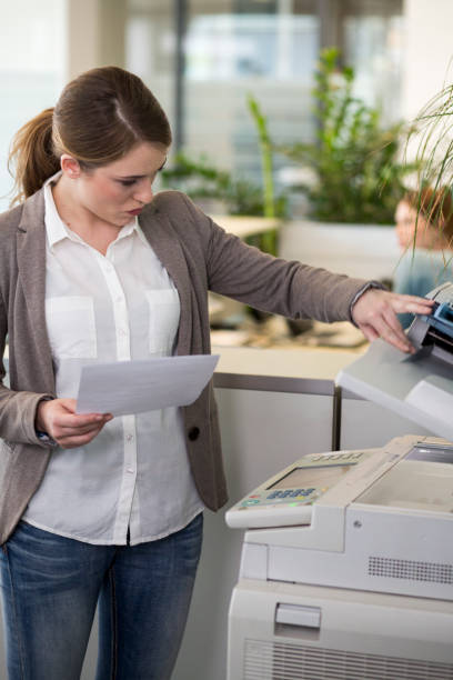 istock Secretary making copies of documents 1294557983