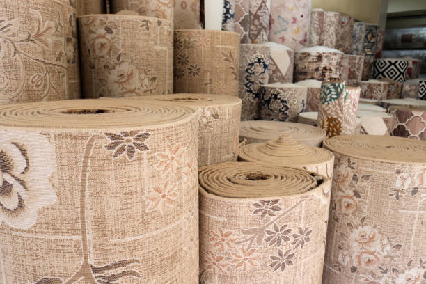 istock Various rugs in the carpet shop. Home decoration. 1294562529