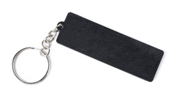 black keychain with space for text isolated on white. - key ring fotos imagens e fotografias de stock