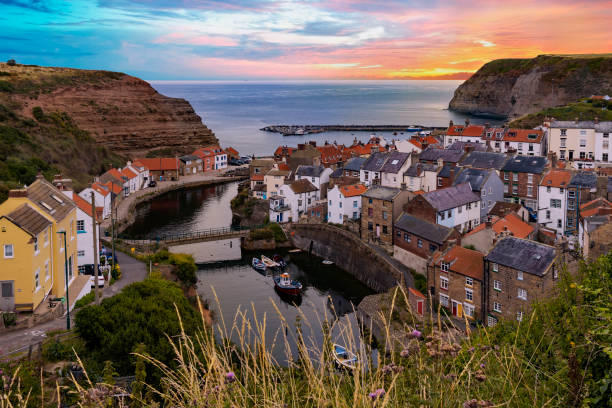 Staithes early in the morning, North Yorkshire, England Staithes is a seaside village in the Scarborough borough of North Yorkshire, England. Formerly one of the many fishing centres in England, Staithes is now largely a tourist destination within the North York Moors National Park. north yorkshire photos stock pictures, royalty-free photos & images