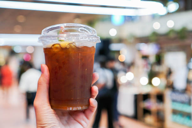 istock Iced black coffee with orange juice. 1294566697