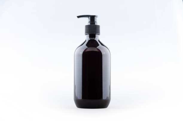 ディスペンサー空気なしポンプと黒ブランクプラスチック透明ボトル - packaging bottle cosmetics container ストックフォトと画像