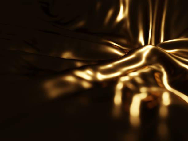 istock 3D rendering of a gold crumpled fabric in the dark 1294578629