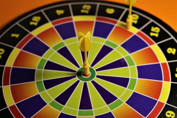 istock Board dartboard with two Darts at the target 1294581777