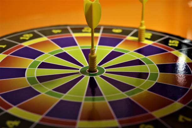 istock Board dartboard with two Darts at the target 1294581986