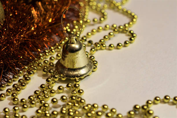 Christmas bell and gold beads