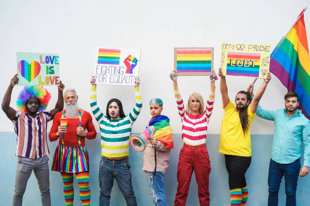 istock Multiracial gay people at LBGT pride - Focus on faces 1294582573
