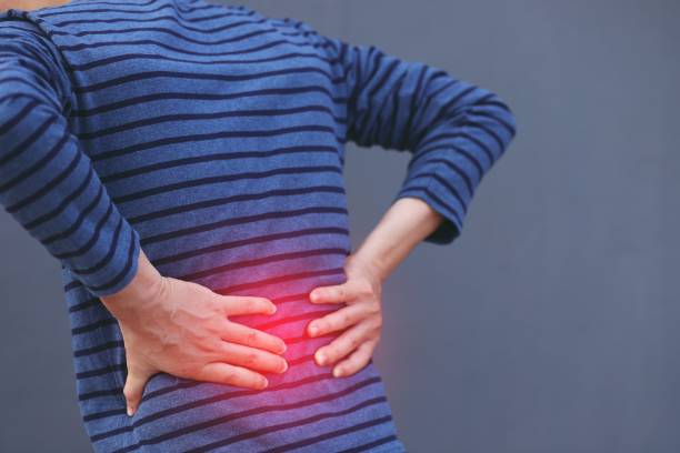 istock The man took the back handle with pain. 1294584670