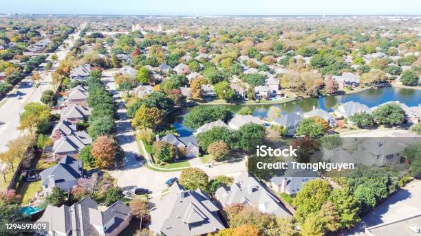 Aerial View Lakeside Neighborhood Near Local Street With Beautiful Fall Leaves In Coppell Texas Usa Stock Photo - Download Image Now