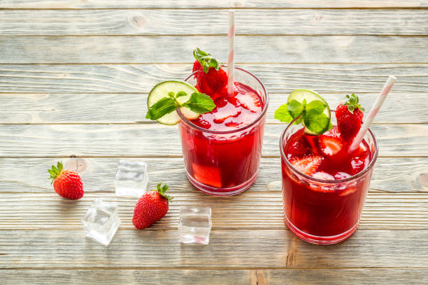 istock Strawberry cocktail or lemonade with ice and mint. Cold red drink 1294592725
