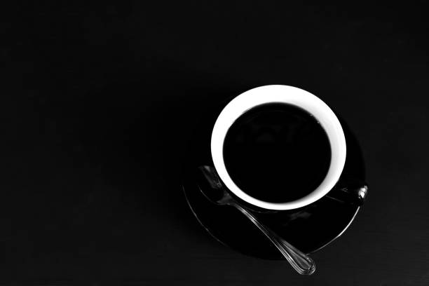 Coffee cup on black background.