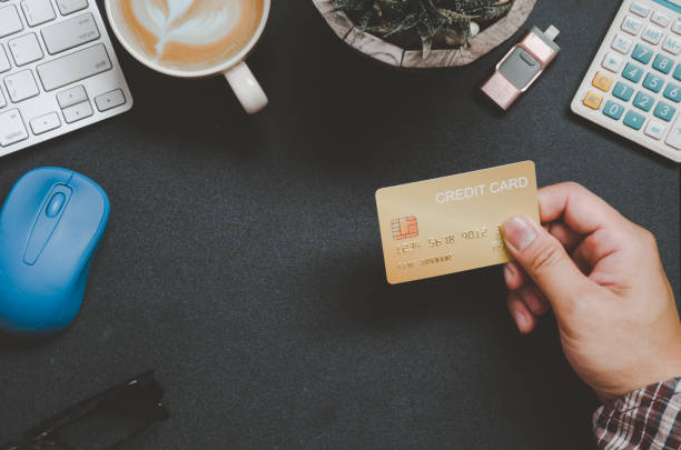 istock hand credit card top view 1294597274