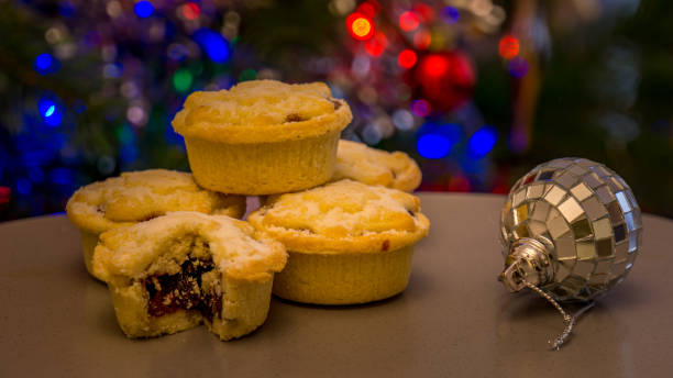 istock mince pies stacked next to a Christmas ornament 1294597994