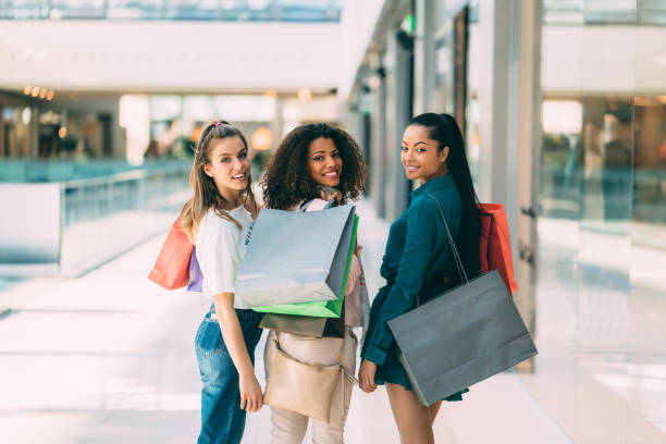 istock Friends in the shopping mall 1294598806