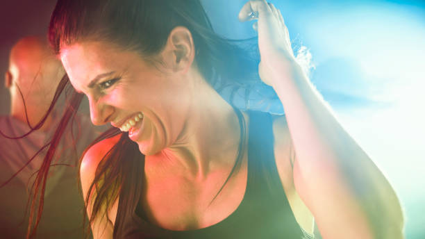 istock Woman dancing in night club 1294598979