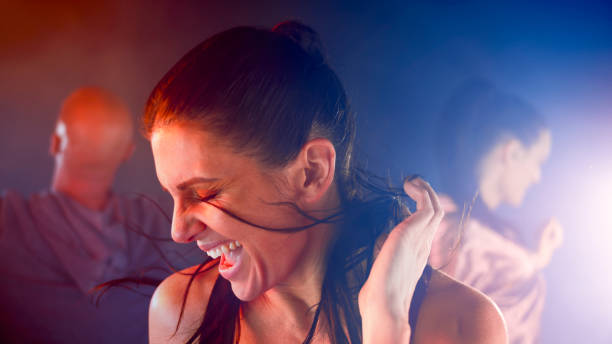 istock Woman dancing in night club 1294599029