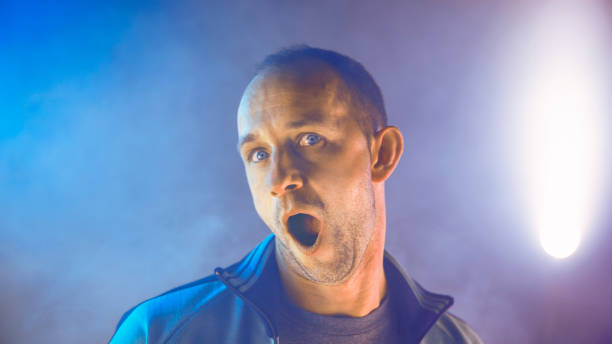 istock Man with funny facial expressions 1294599059