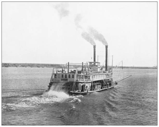 ilustraciones, imágenes clip art, dibujos animados e iconos de stock de fotografía antigua: steamboat, mississippi - mississippi