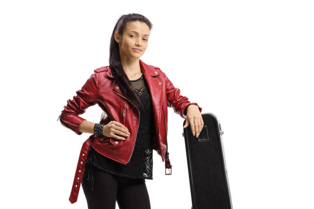 istock Young female musician leaning on a guitar case 1294601506