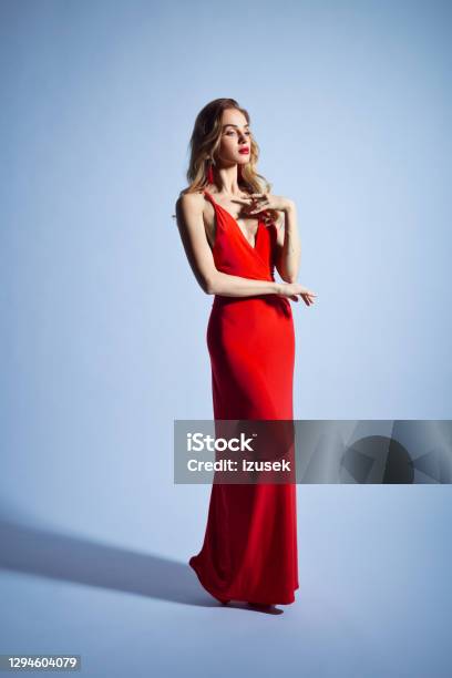Elegant Woman In Red Dress Stock Photo - Download Image Now - One Woman Only, Women, Dress