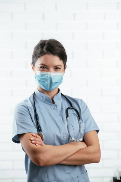 istock Young doctor with medical mask. 1294605512