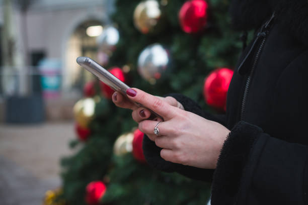 istock Female hands and phone close up 1294608617