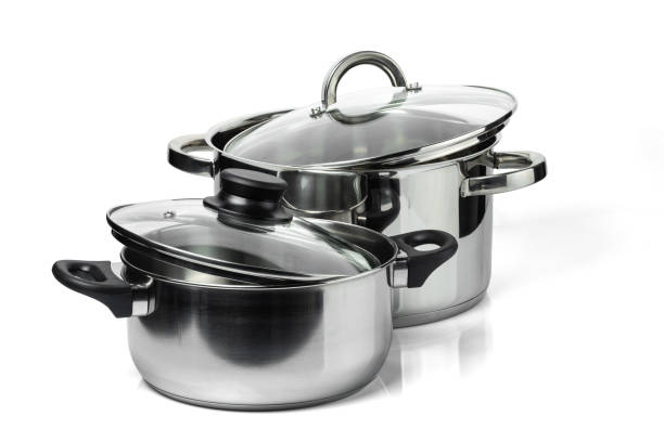 istock Two stainless steel pans with glass lids. 1294609067