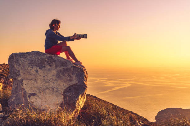 istock Woman with camera take travel photo 1294610171