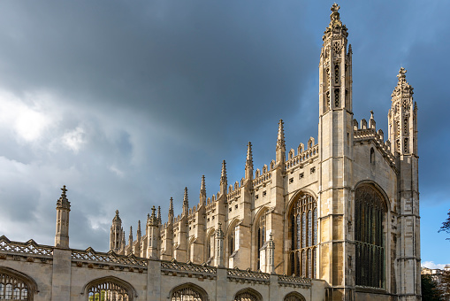 Kings College Chapel grounds, Cambridge, England, UK. viewed from a public footpath on King's Parade.