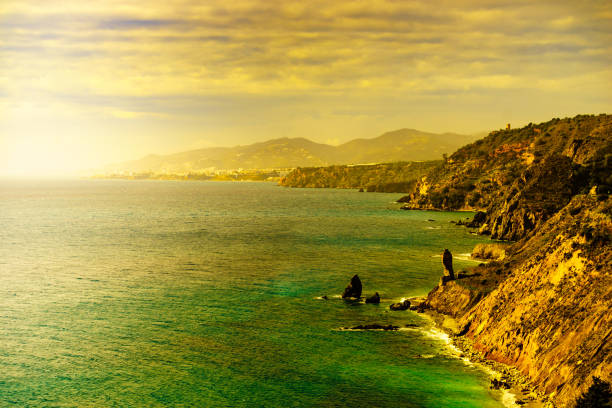 Beach on a sunny day. Mediterranean coast, sea. Alcossebre, Valencia Spain. . High quality photo
