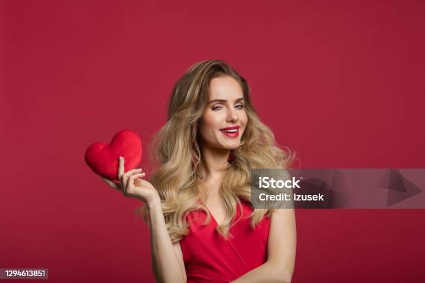 Beautiful Woman Holding Red Heart Stock Photo - Download Image Now - One Woman Only, Elegance, Love - Emotion