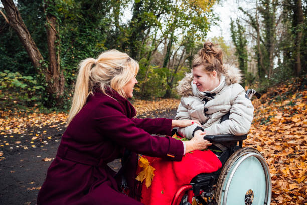 istock Mother and Daughter on a Autumnal Walk 1294615722