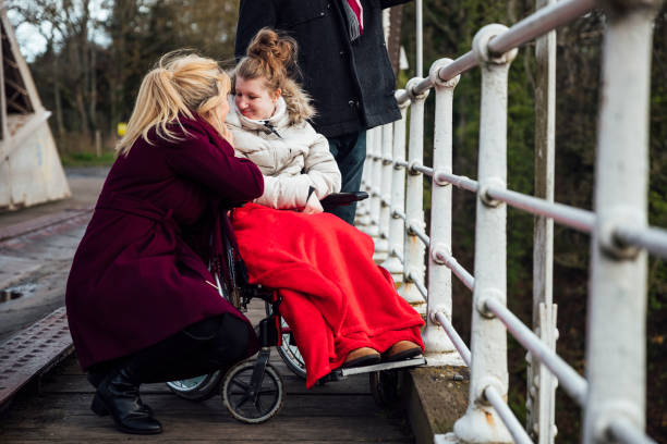 istock Family Walk Over a Bridge 1294616055