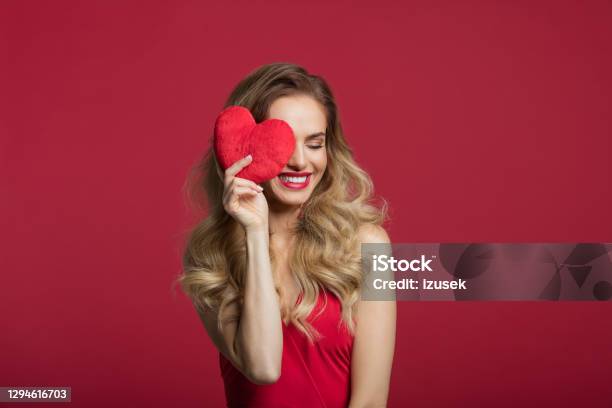 Happy Woman Holding Red Heart Stock Photo - Download Image Now - Valentine's Day - Holiday, Women, One Woman Only