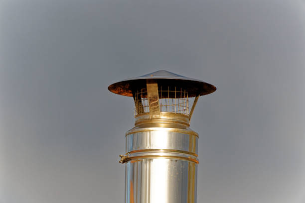 Chrome chimney stack on the top of a roof in England