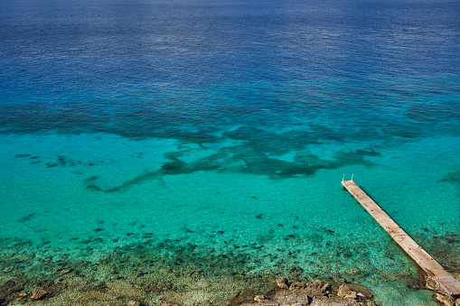 Pier over the Caribbean Sea on Cozumel Island off the Yucatan Peninsula of Mexico