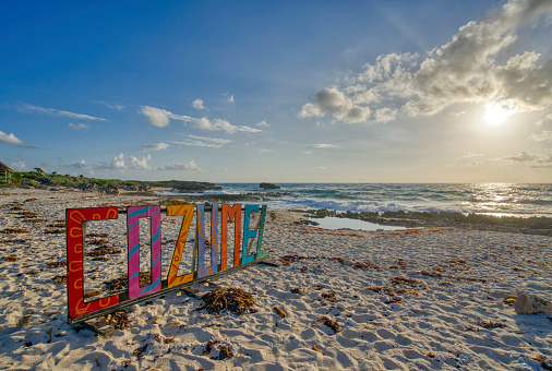 Maxwell beach, Barbados in the Caribbean. At dusk in the evening. February 2023 beach umbrellas
