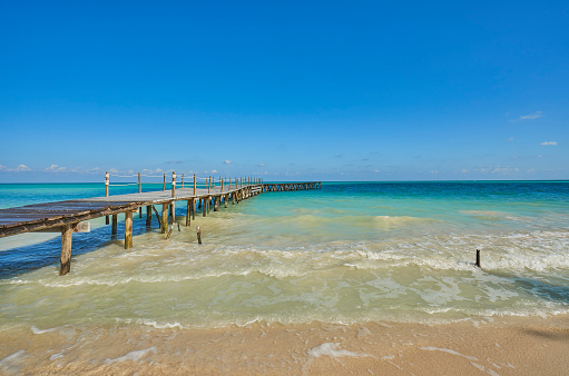 Pier over the Caribbean Sea on Cozumel Island's Isla Pasion  off the Yucatan Peninsula of Mexico