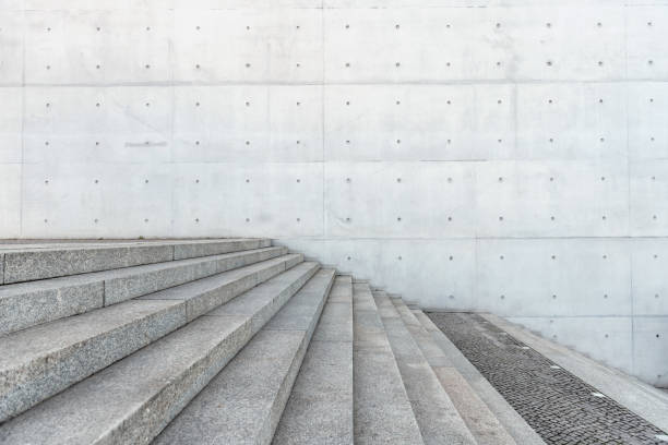 istock stone stairs in front of concrete wall 1294629108