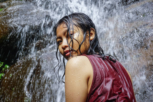 istock Indonesian Girl at Curug Waterfall Cilember 1294630649