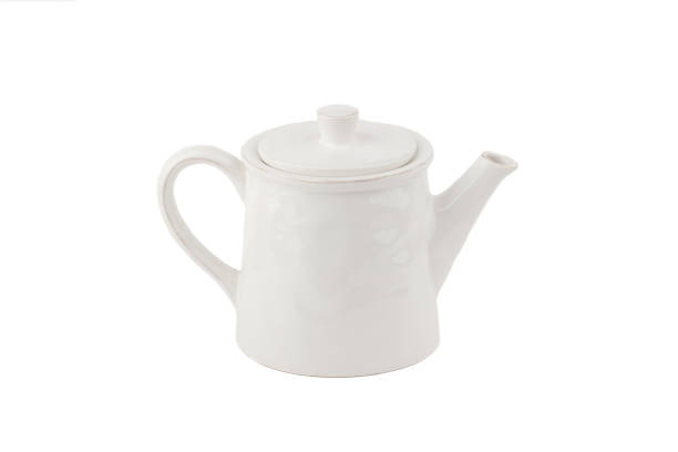 istock White ceramic teapot for coffee or tea, white background 1294633089