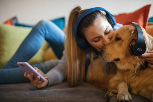istock Young woman enjoying with her dog 1294640117