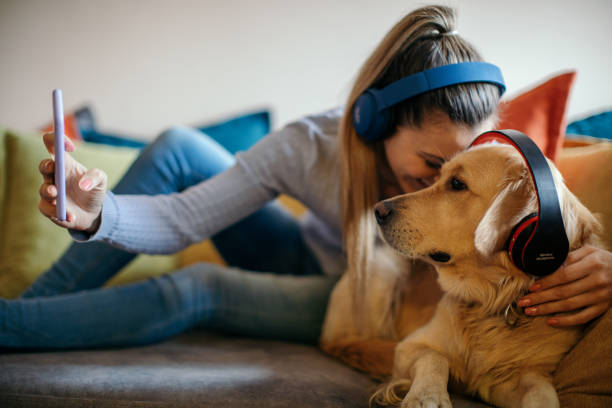 istock Young woman enjoying with her dog 1294640158