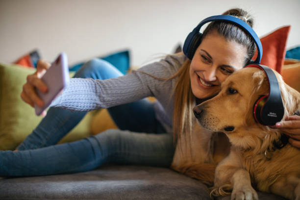 istock Young woman enjoying with her dog 1294640195