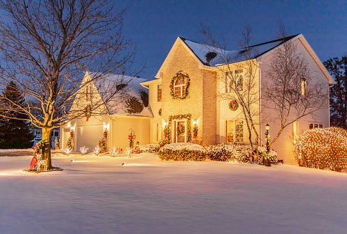 Beautiful holiday home decorated and aglow with Christmas lights