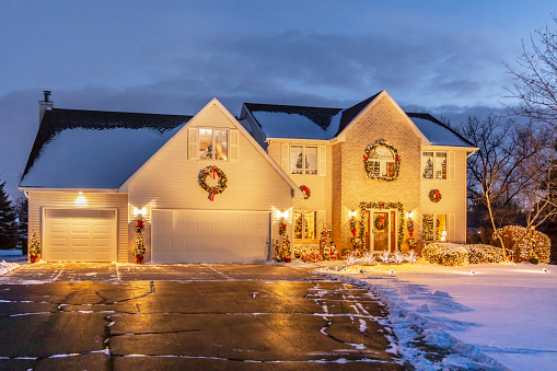 Beautiful holiday home decorated and aglow with Christmas lights