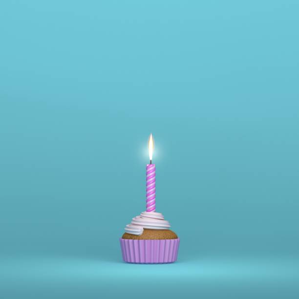 istock A birthday candle lighting on a creamy muffin cupcake 1294640446
