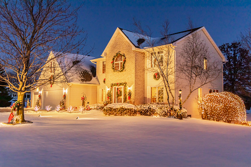Beautiful holiday home decorated and aglow with Christmas lights