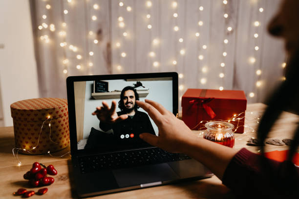 istock Young couple having a videoconference on Valentine's day 1294643084